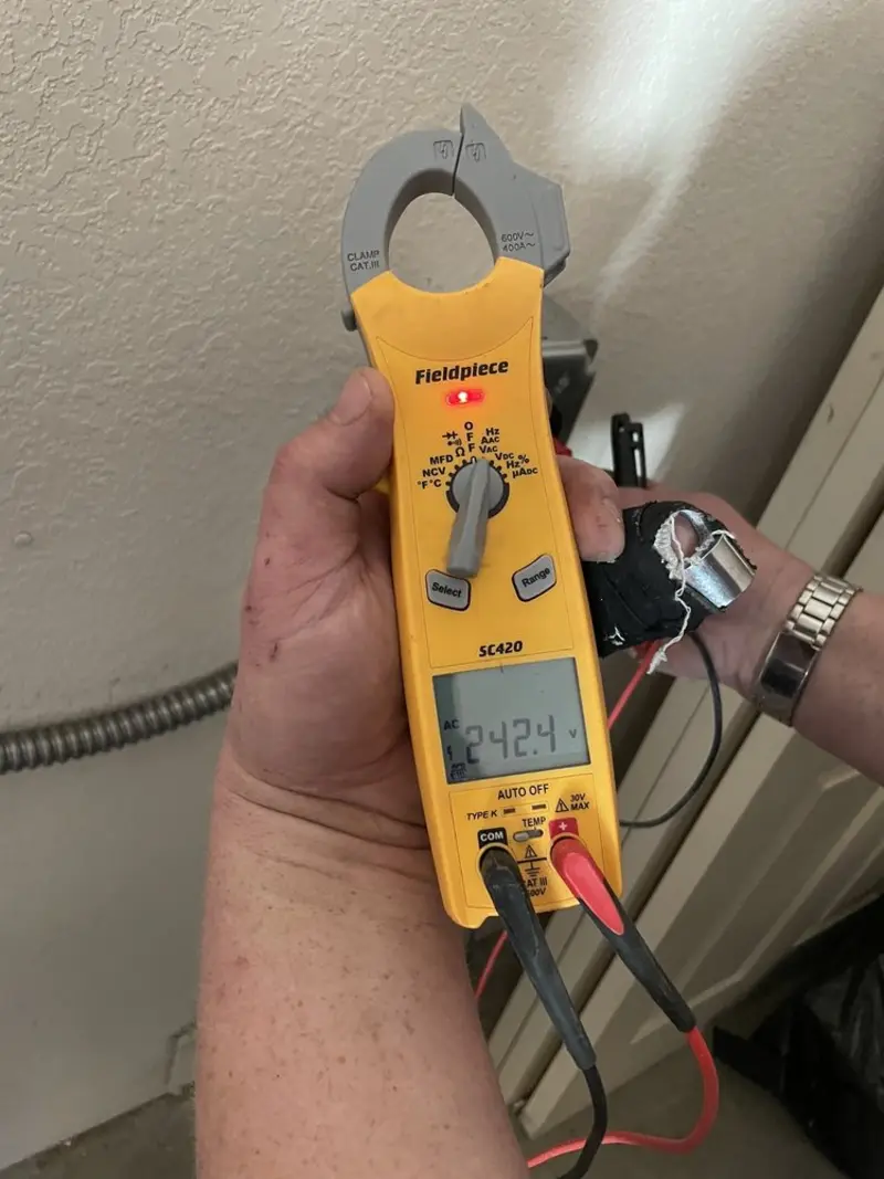 Voltage testing with clamp meter during Ceiling Fan Installation in Warwick